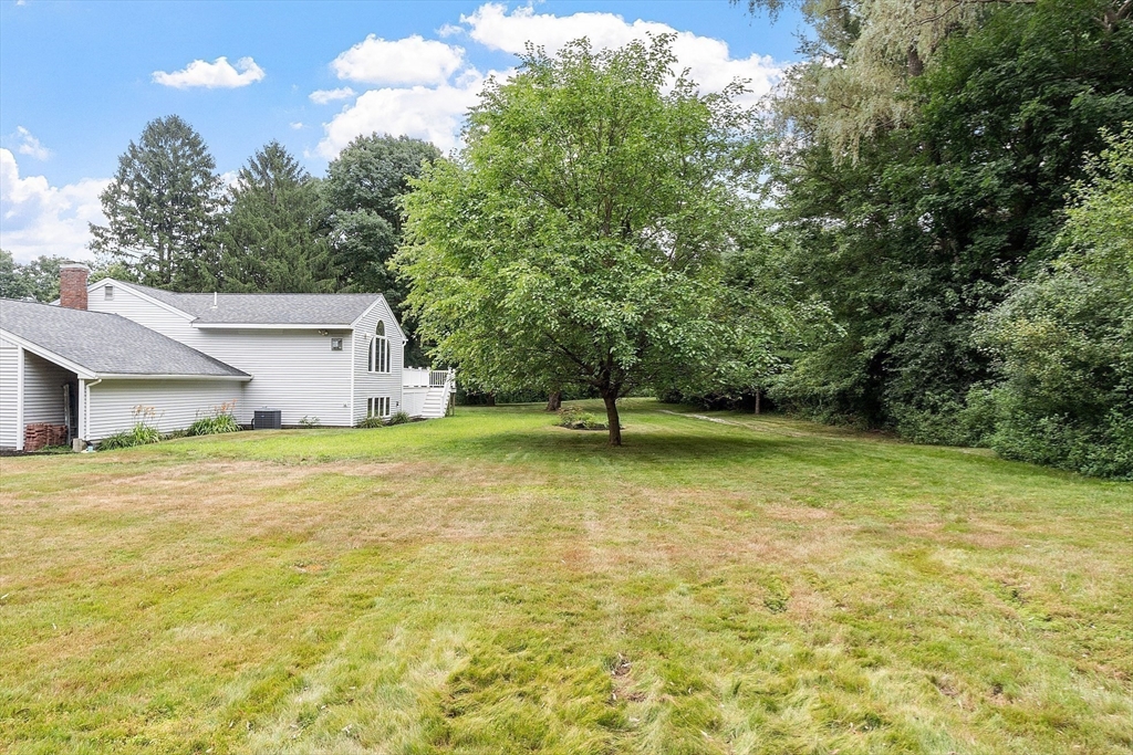 2 Johnson Road Chelmsford, MA 01824 - Photo 36 of 42 a view of a house with a yard