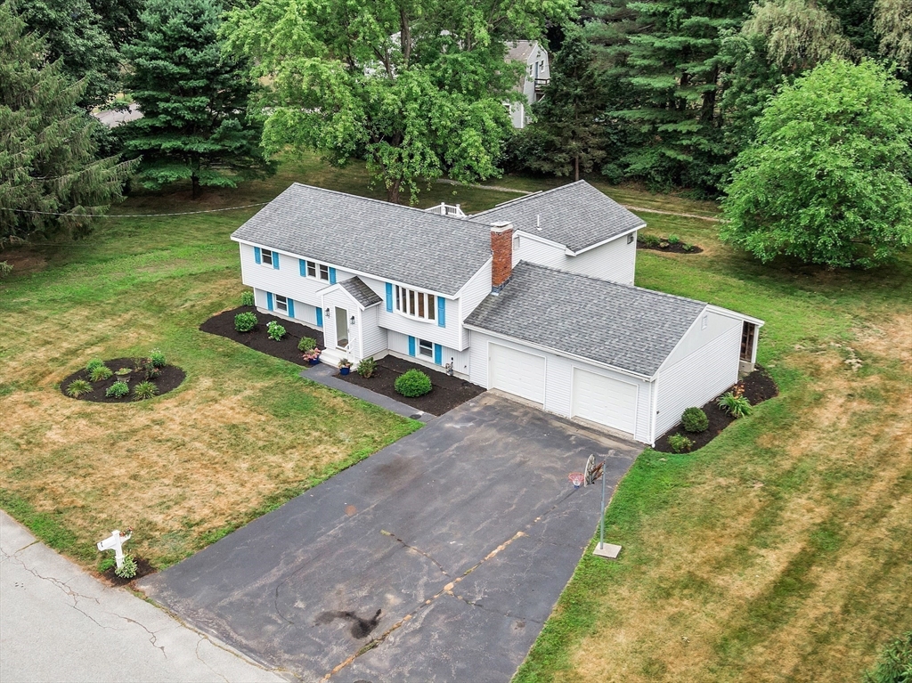 2 Johnson Road Chelmsford, MA 01824 - Photo 37 of 42 an aerial view of a house with garden space and a patio