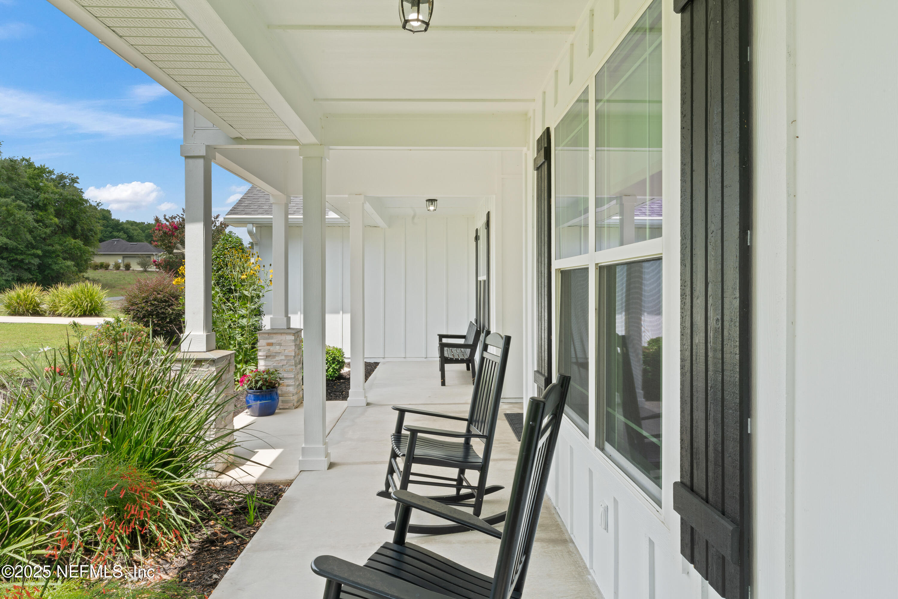 6228 Blue Marlin Drive Keystone Heights, FL 32656 - Photo 17 of 45 a view of an chairs and tables in the balcony