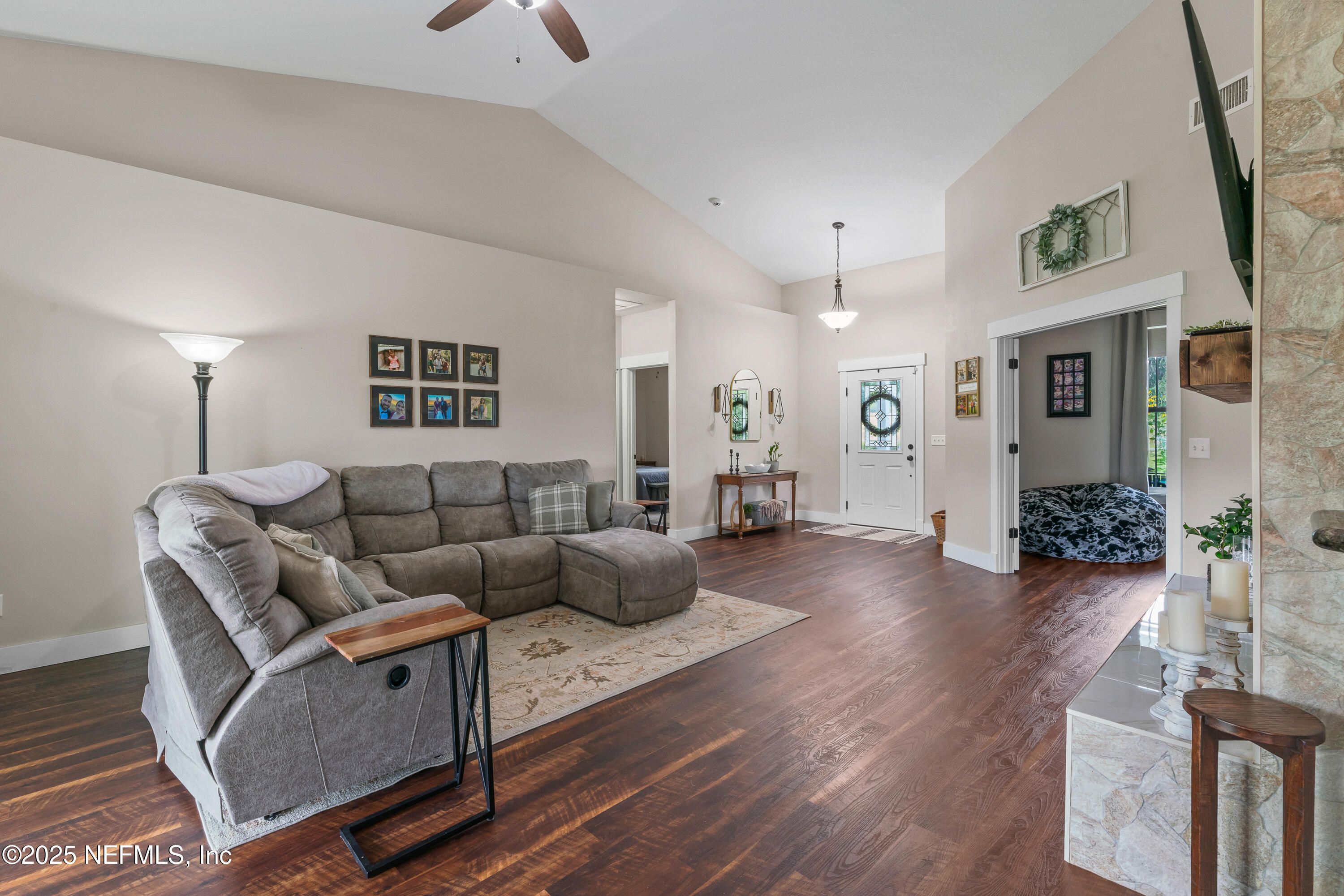 6228 Blue Marlin Drive Keystone Heights, FL 32656 - Photo 21 of 45 a living room with furniture and a wooden floor