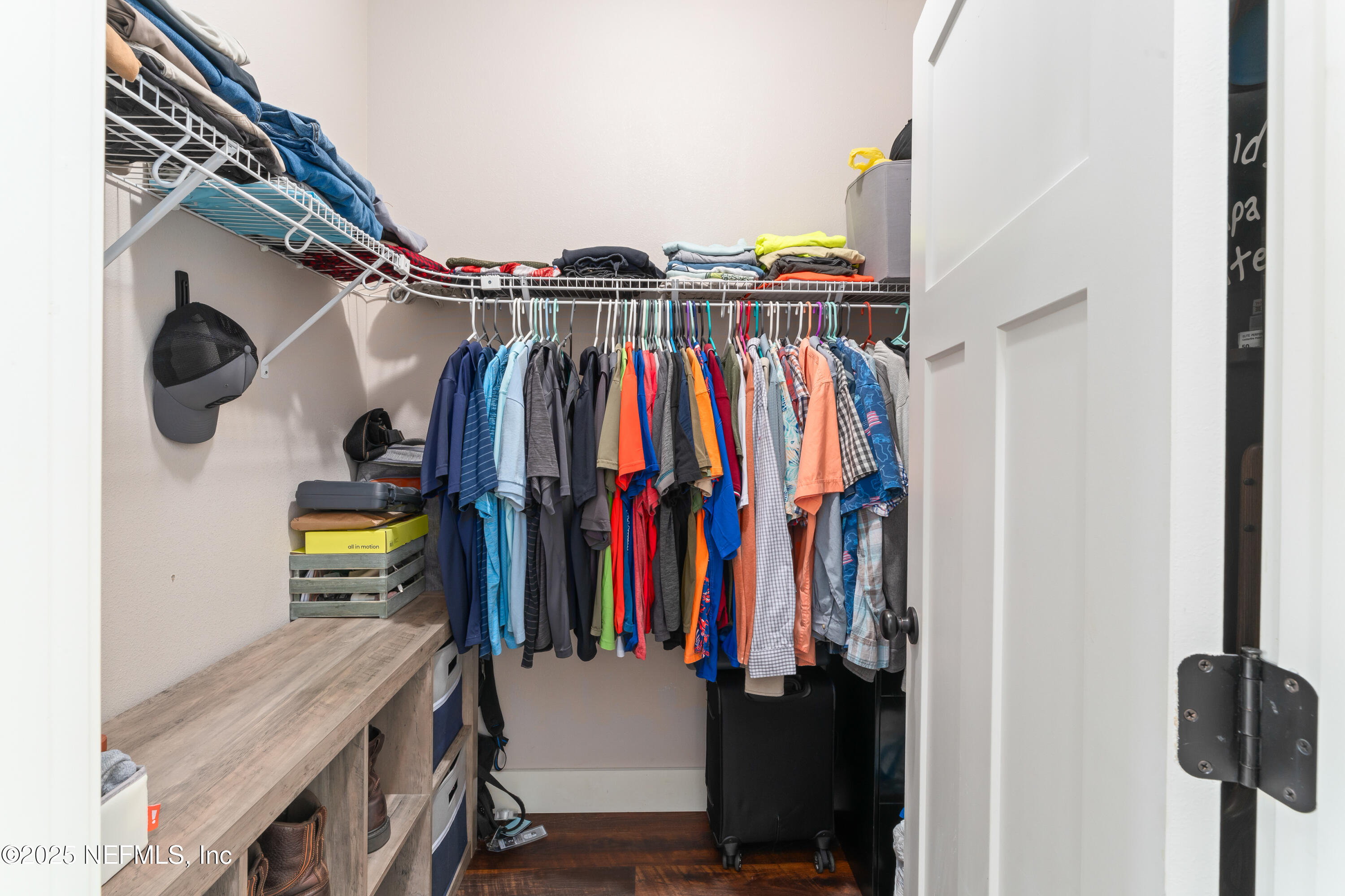 6228 Blue Marlin Drive Keystone Heights, FL 32656 - Photo 34 of 45 a view of walk in closet with clothes and shoes