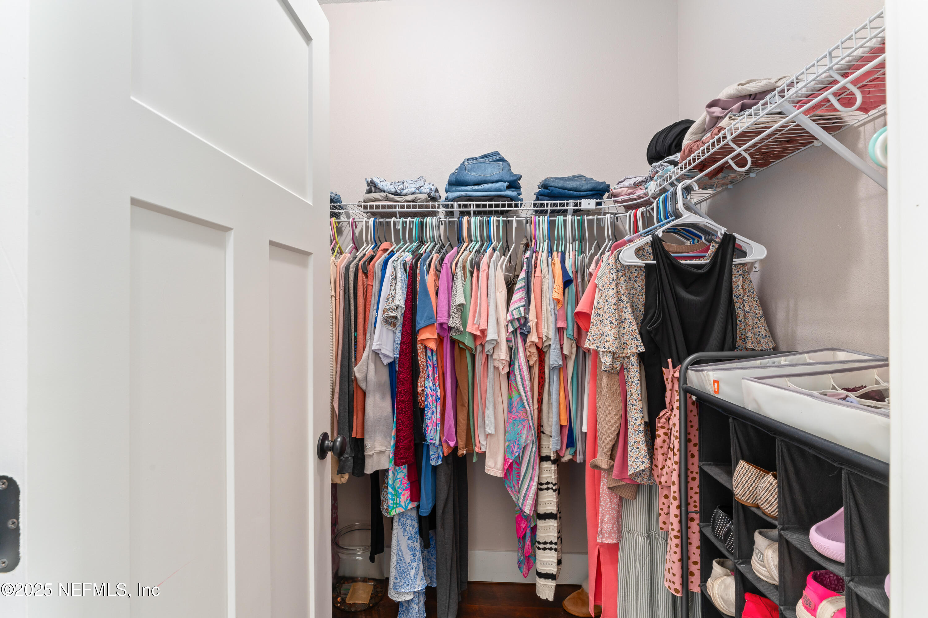 6228 Blue Marlin Drive Keystone Heights, FL 32656 - Photo 35 of 45 a view of walk in closet with clothes