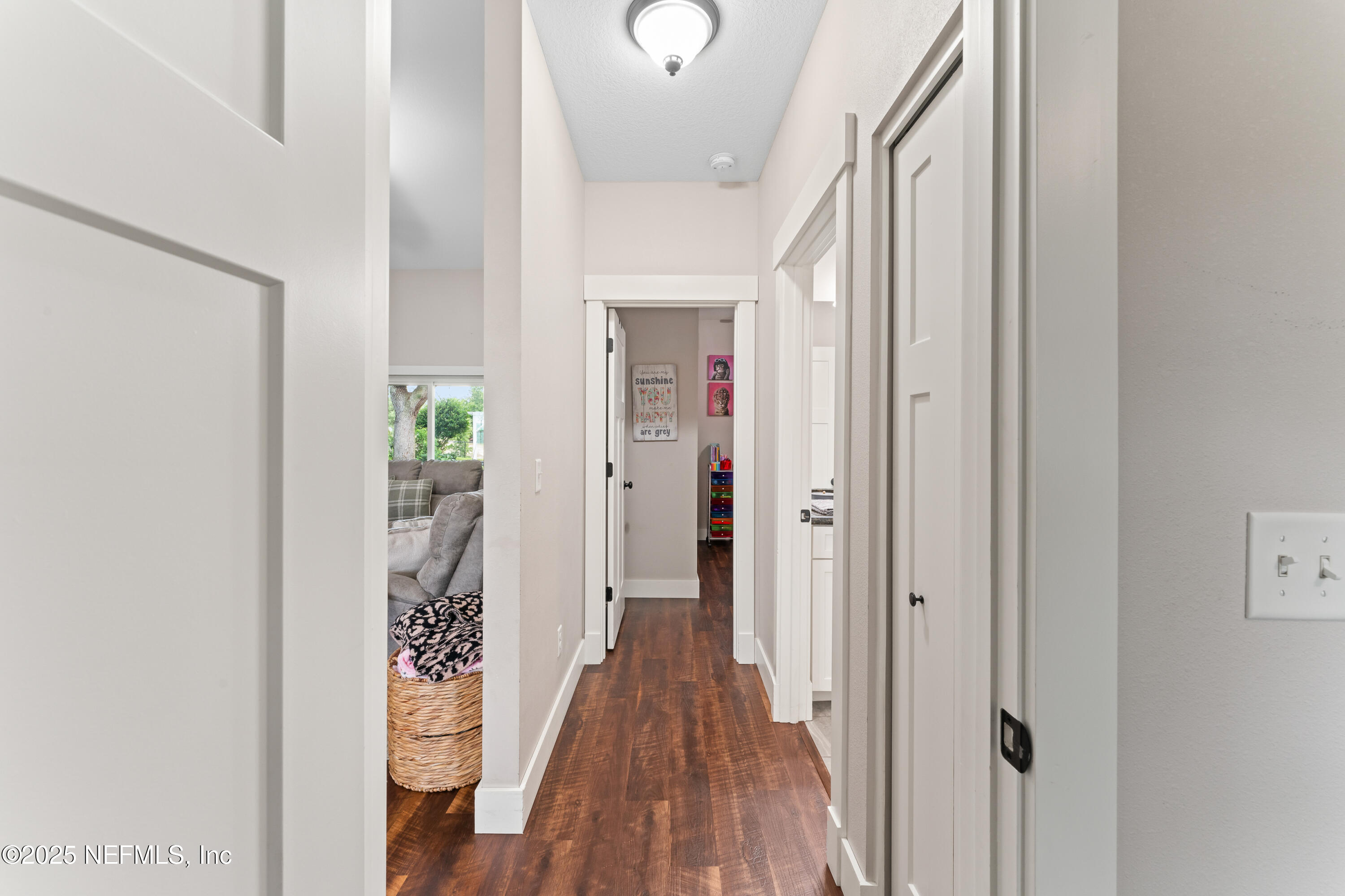 6228 Blue Marlin Drive Keystone Heights, FL 32656 - Photo 36 of 45 a view of a hallway with wooden floor