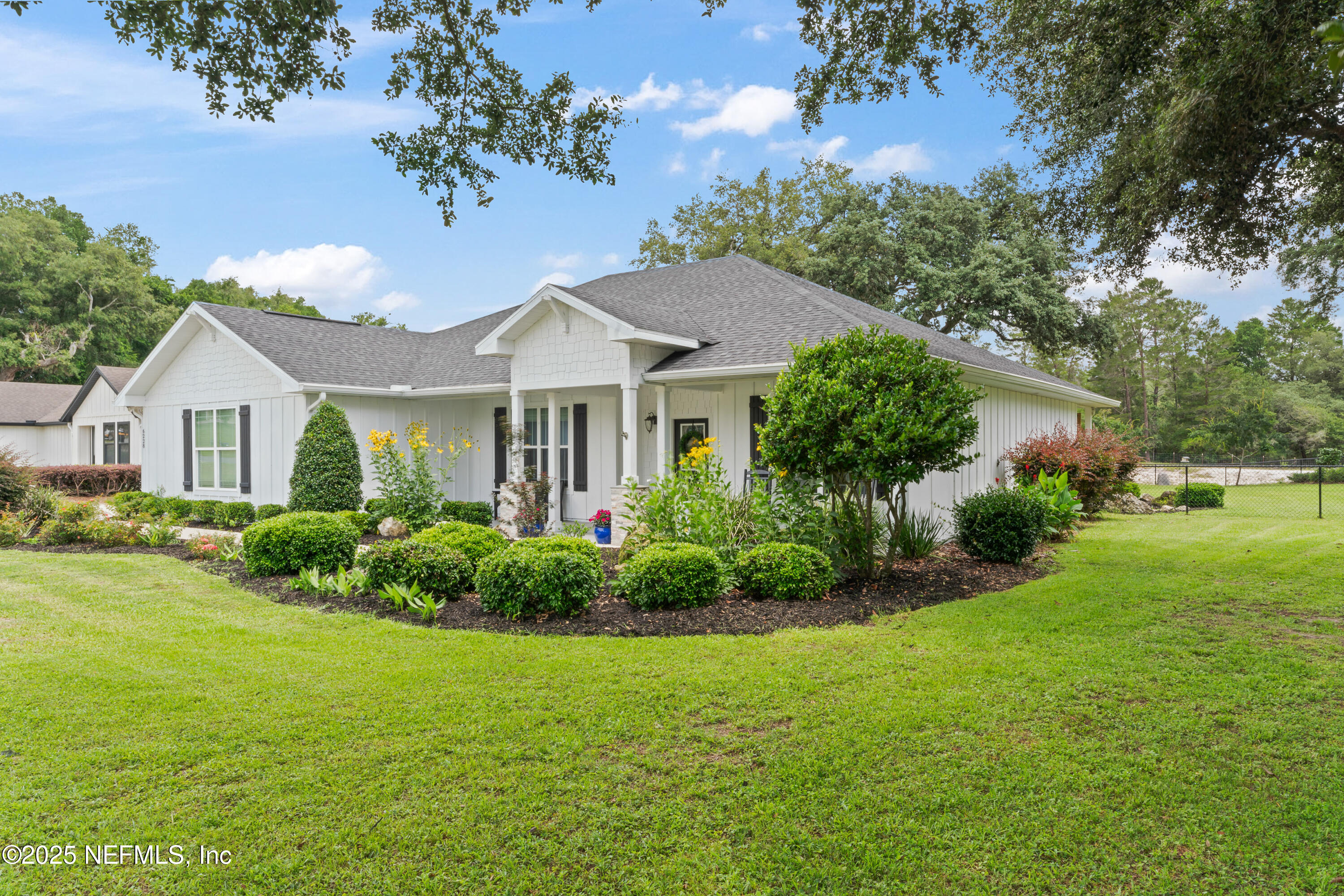 6228 Blue Marlin Drive Keystone Heights, FL 32656 - Photo 4 of 45 a front view of a house with a yard