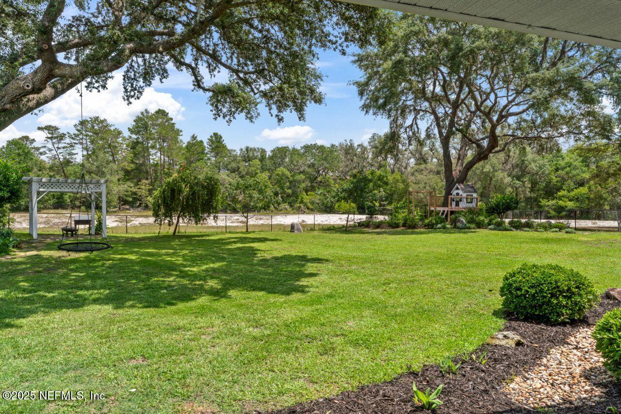 6228 Blue Marlin Drive Keystone Heights, FL 32656 - Photo 8 of 45 a view of a park with large trees