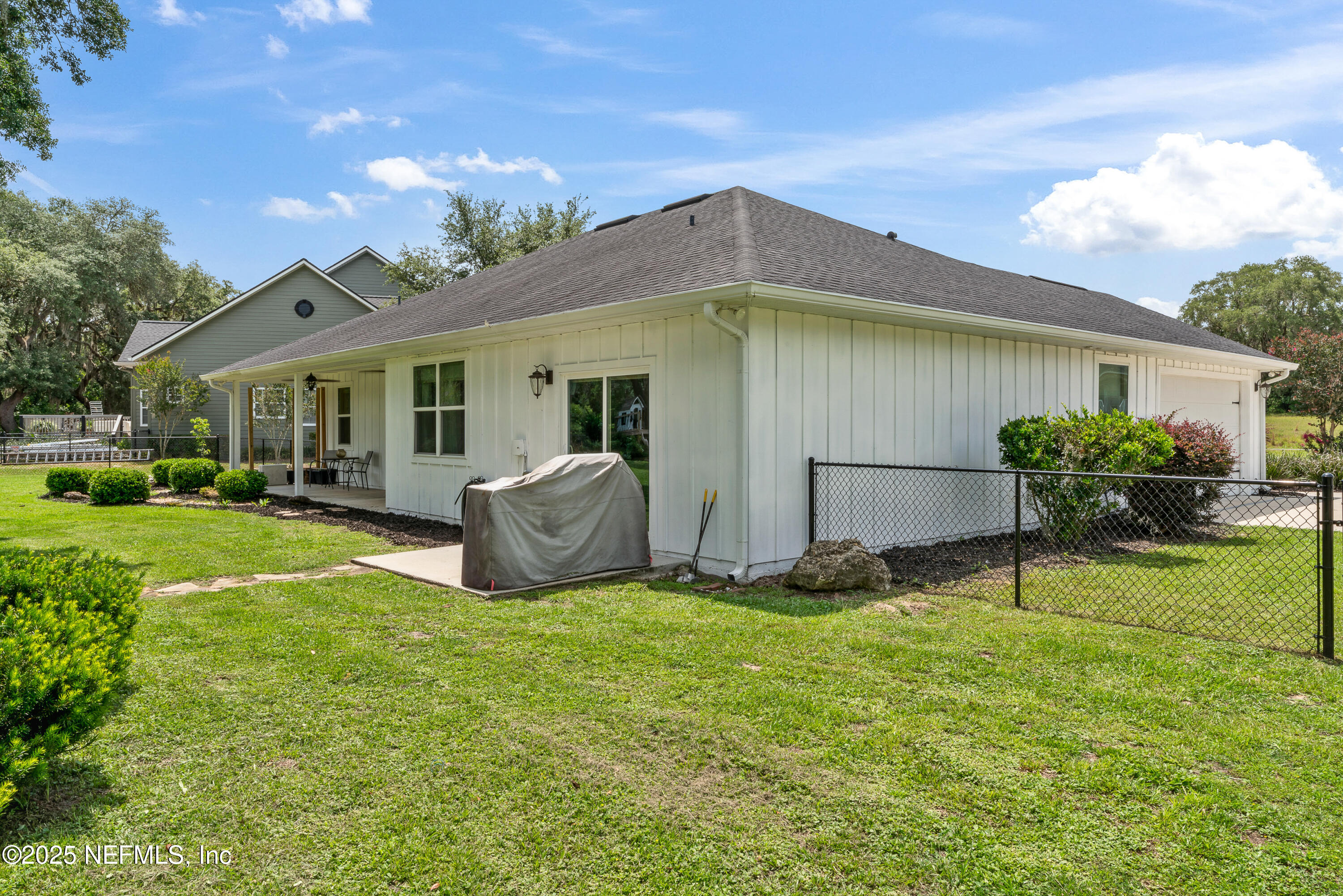 6228 Blue Marlin Drive Keystone Heights, FL 32656 - Photo 10 of 45 a view of a house with a yard