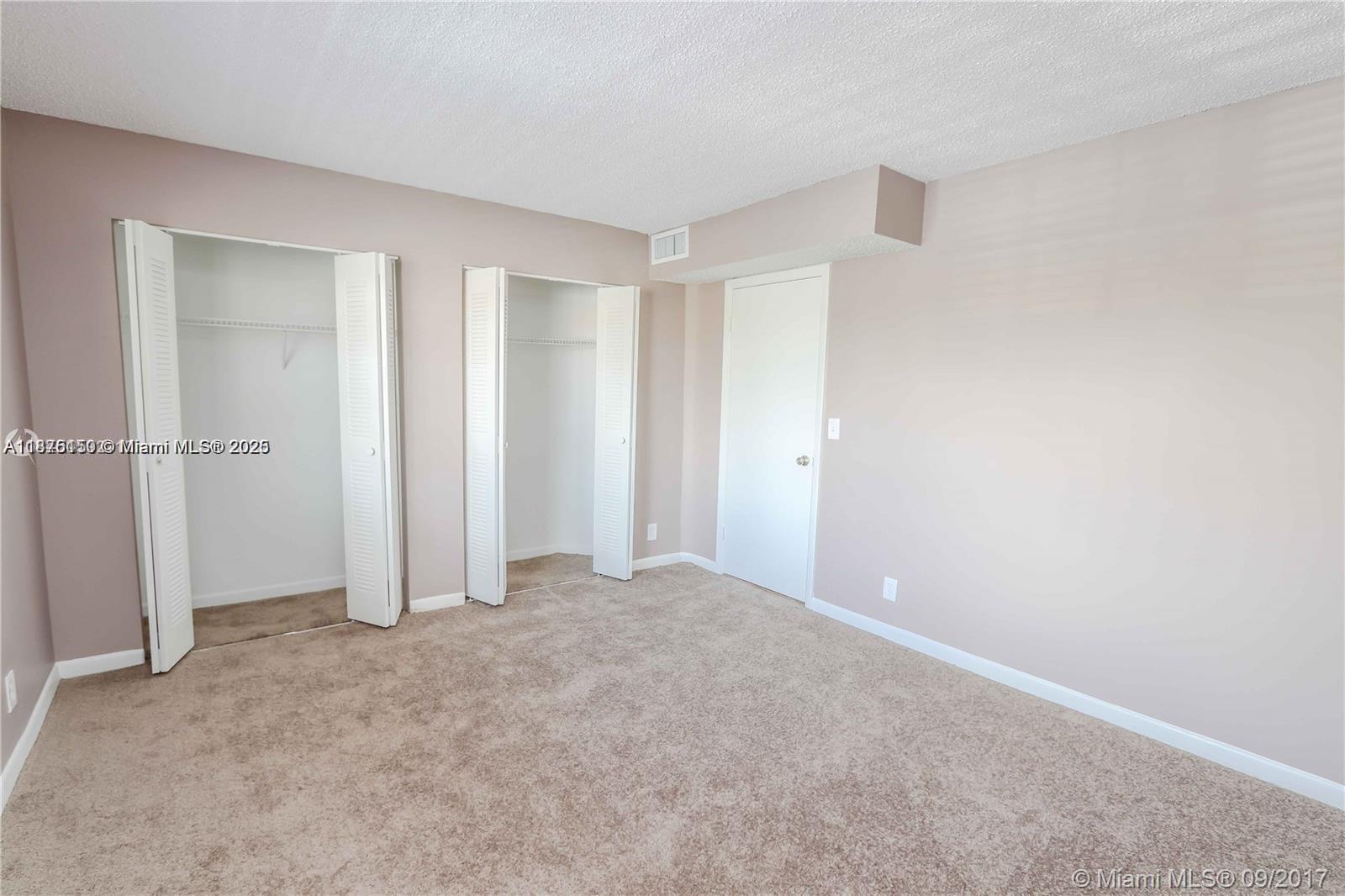 8734 Southwest 3rd Street, Unit 206 Pembroke Pines, FL 33025 - Photo 7 of 14 a view of an empty room