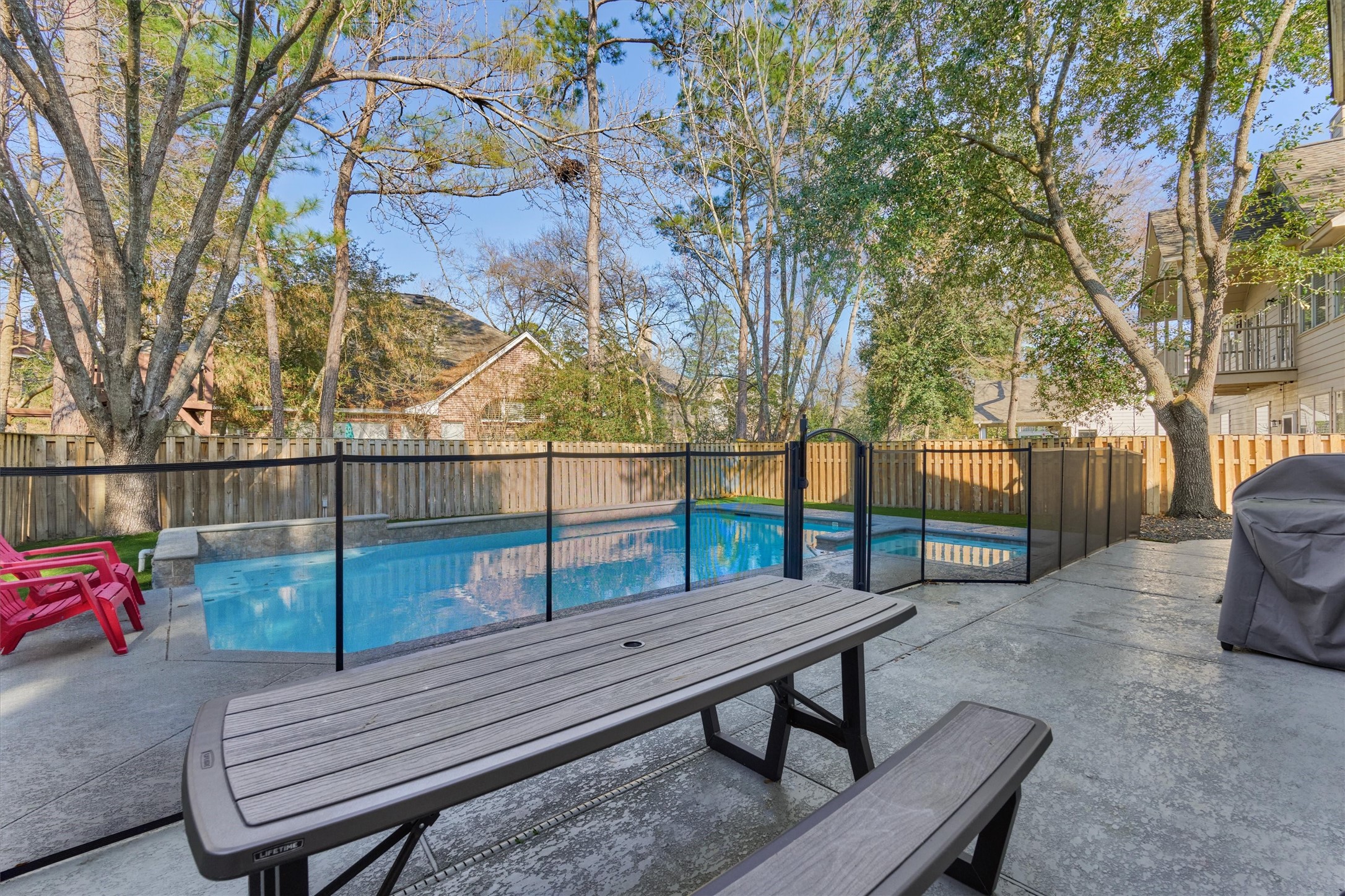 58 South Bethany Bend Circle Spring, TX 77382 - Photo 35 of 45 The added pool fence will give you peace of mind year-round!