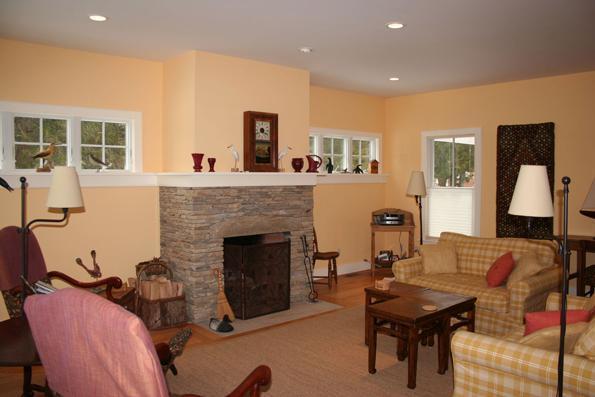 64 Gibson Road Orleans, MA 02653 - Photo 10 of 27 a living room with furniture and a fireplace