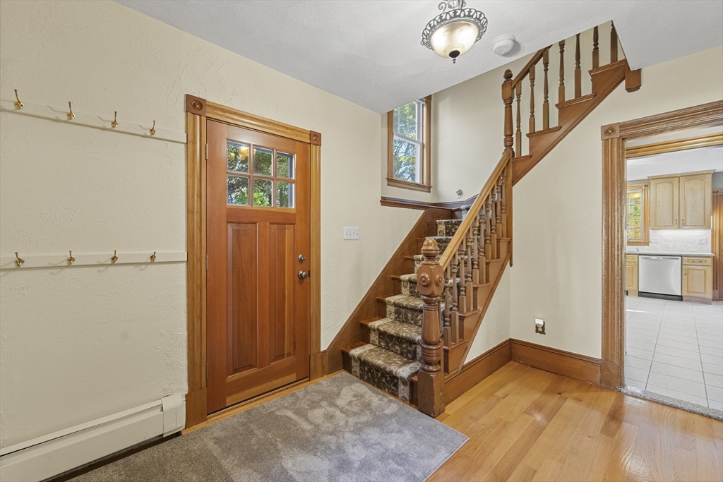 3 Laurel Street Woburn, MA 01801 - Photo 13 of 40 a view of an entryway with wooden floor