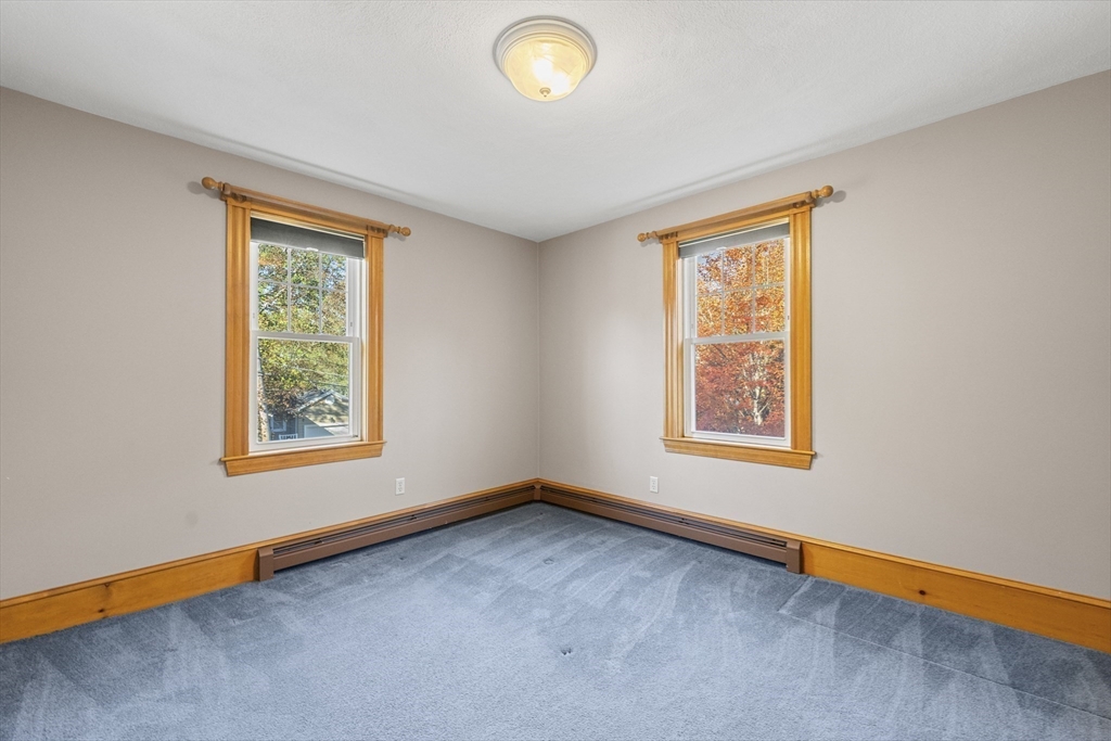 3 Laurel Street Woburn, MA 01801 - Photo 28 of 40 an empty room with a window