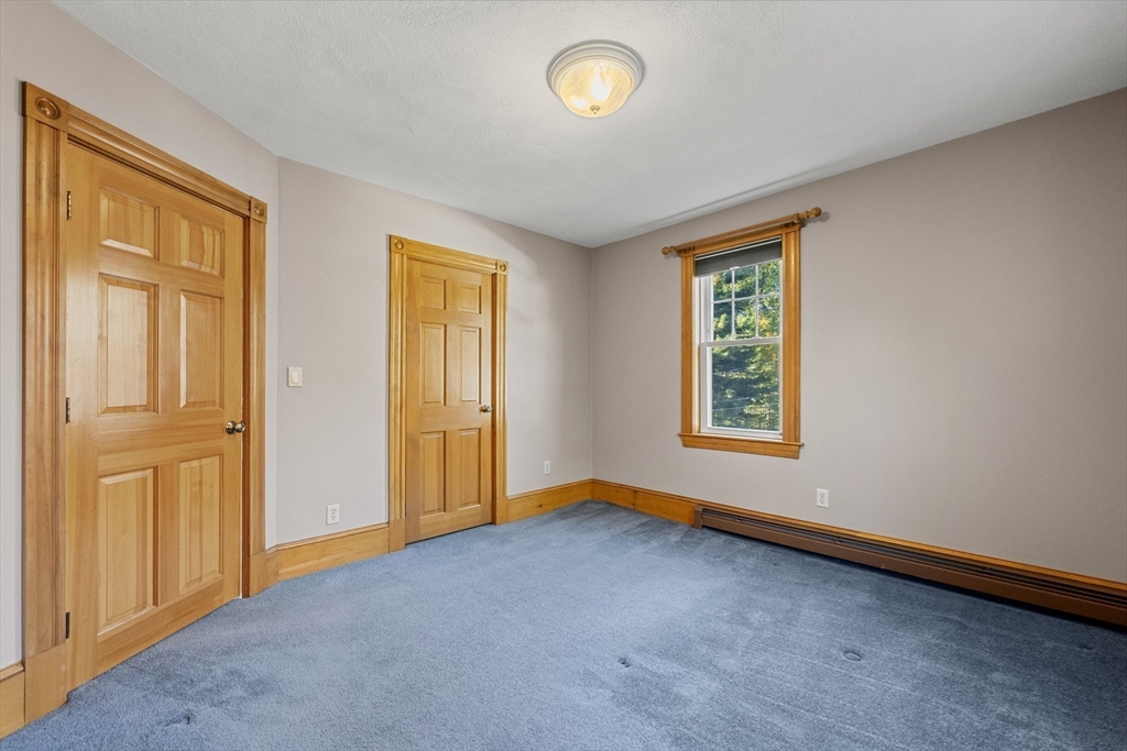 3 Laurel Street Woburn, MA 01801 - Photo 29 of 40 a view of an empty room with a window