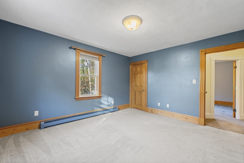 3 Laurel Street Woburn, MA 01801 - Photo 30 of 40 an empty room with windows and closet