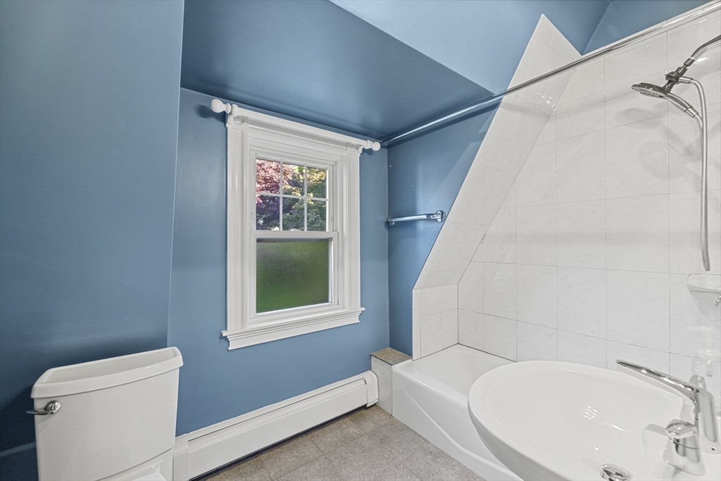 3 Laurel Street Woburn, MA 01801 - Photo 32 of 40 a bathroom with a sink and toilet