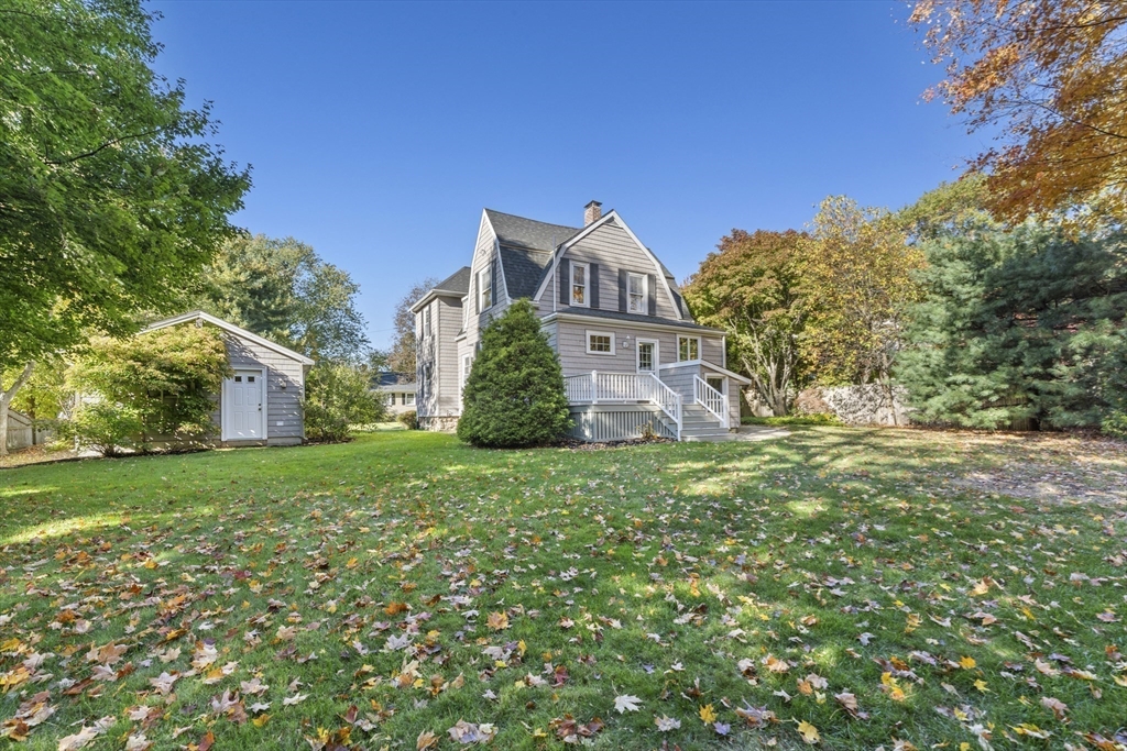 3 Laurel Street Woburn, MA 01801 - Photo 35 of 40 a front view of a house with a yard