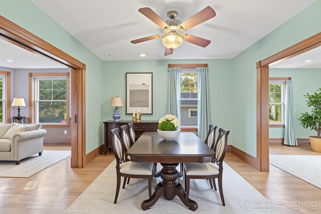 3 Laurel Street Woburn, MA 01801 - Photo 7 of 40 a view of a dining room with furniture window and wooden floor