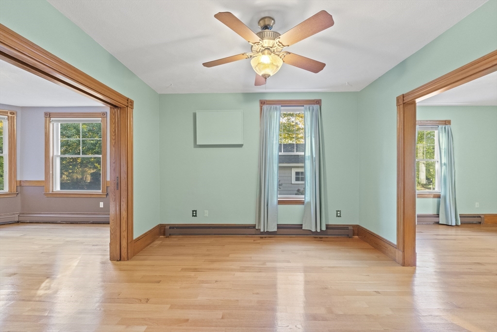 3 Laurel Street Woburn, MA 01801 - Photo 8 of 40 an empty room with closet and fan