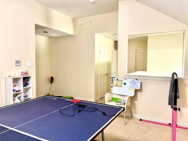 a room with furniture and a table