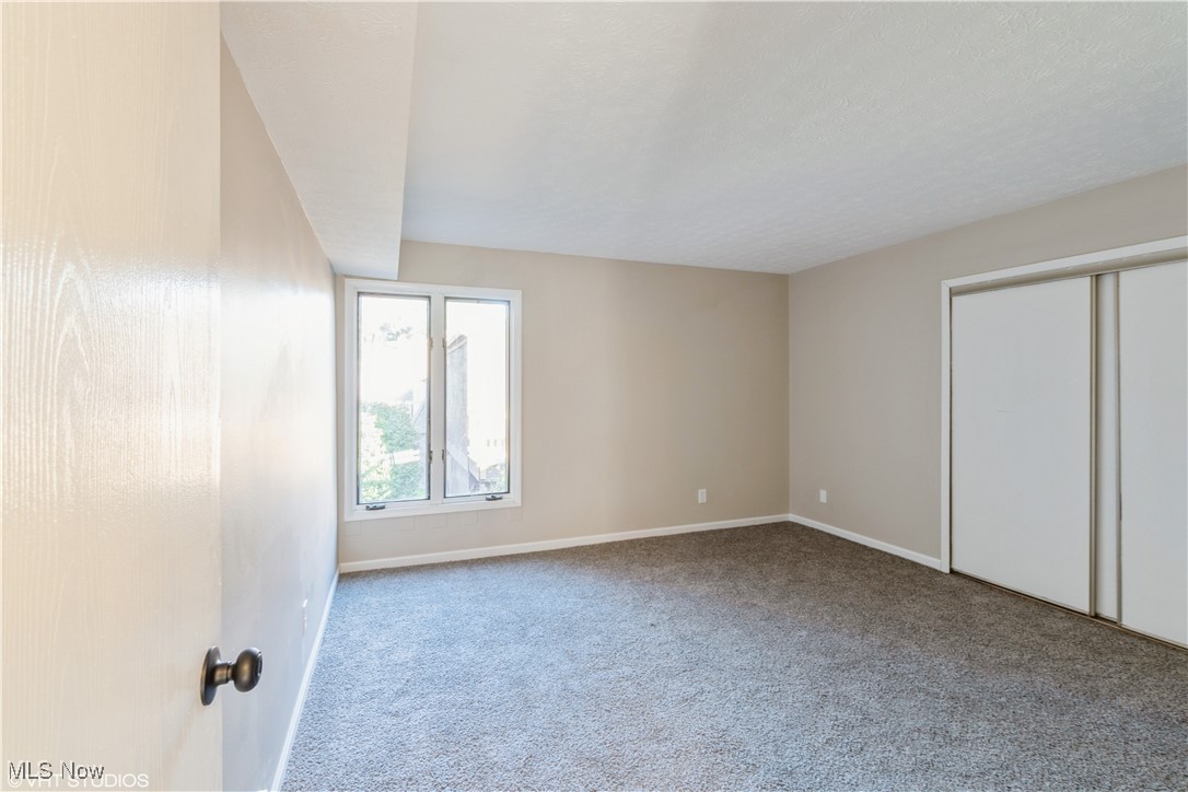 3725 Mayfield Road Cleveland Heights, OH 44121 - Photo 15 of 16 Unfurnished bedroom featuring carpet flooring