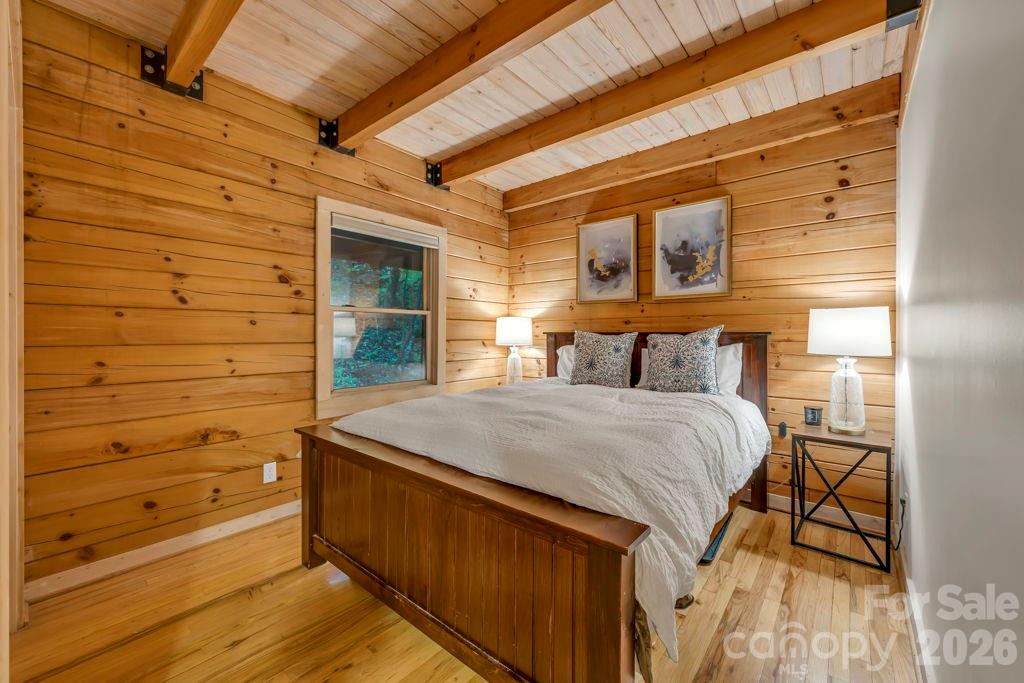 192 Dewitt Barnett Road, Unit 2 Vilas, NC 28692 - Photo 18 of 32 a bedroom with a bed and a dresser