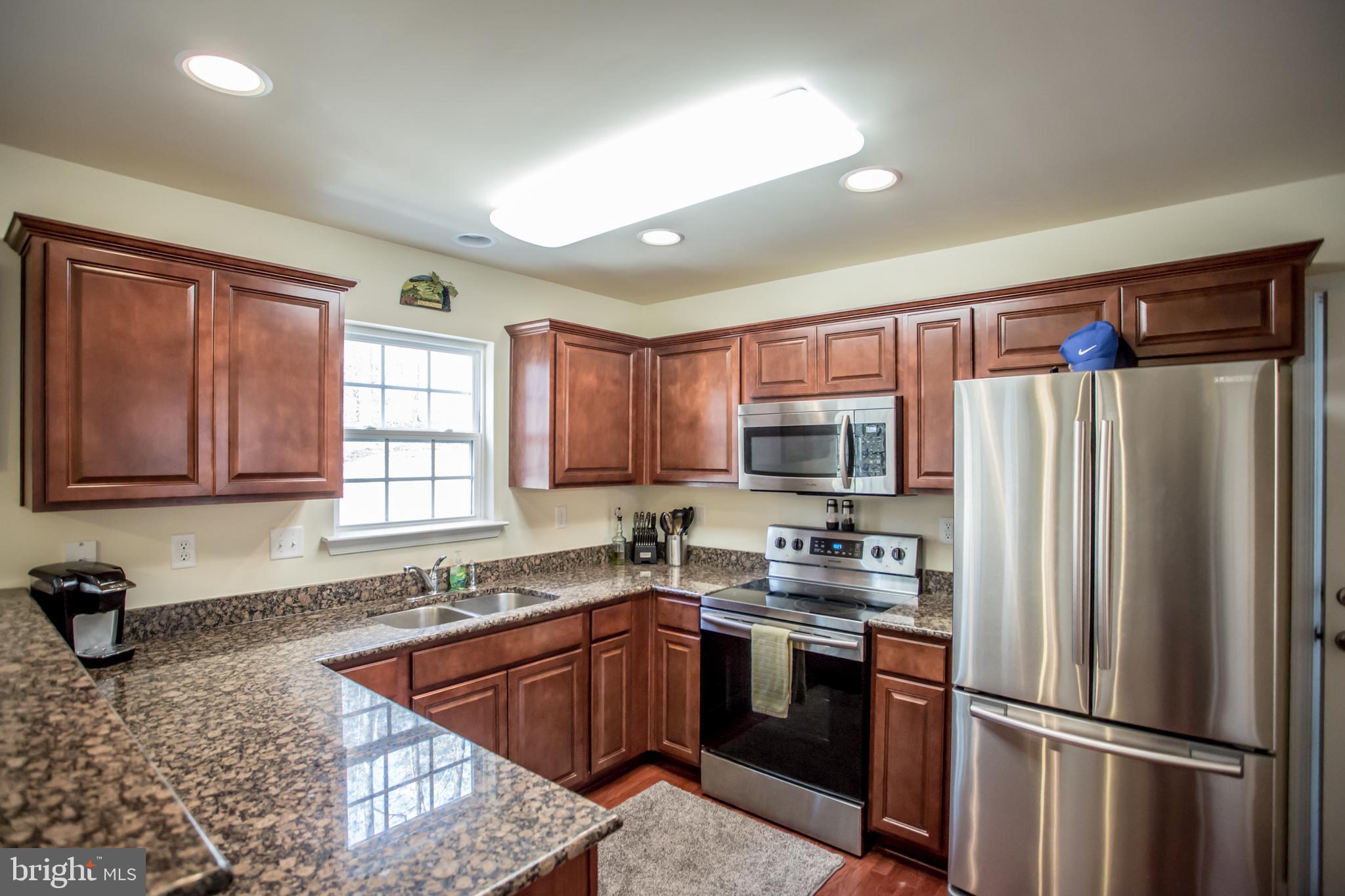 12450 Elk Run Church Road Midland, VA 22728 - Photo 7 of 41 Expansive Kitchen with Granite and Stainless Steel