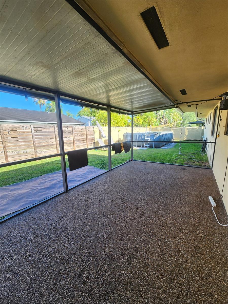 11025 Southwest 138th Court, Unit 11025 Miami, FL 33186 - Photo 19 of 21 a view of outdoor space and porch