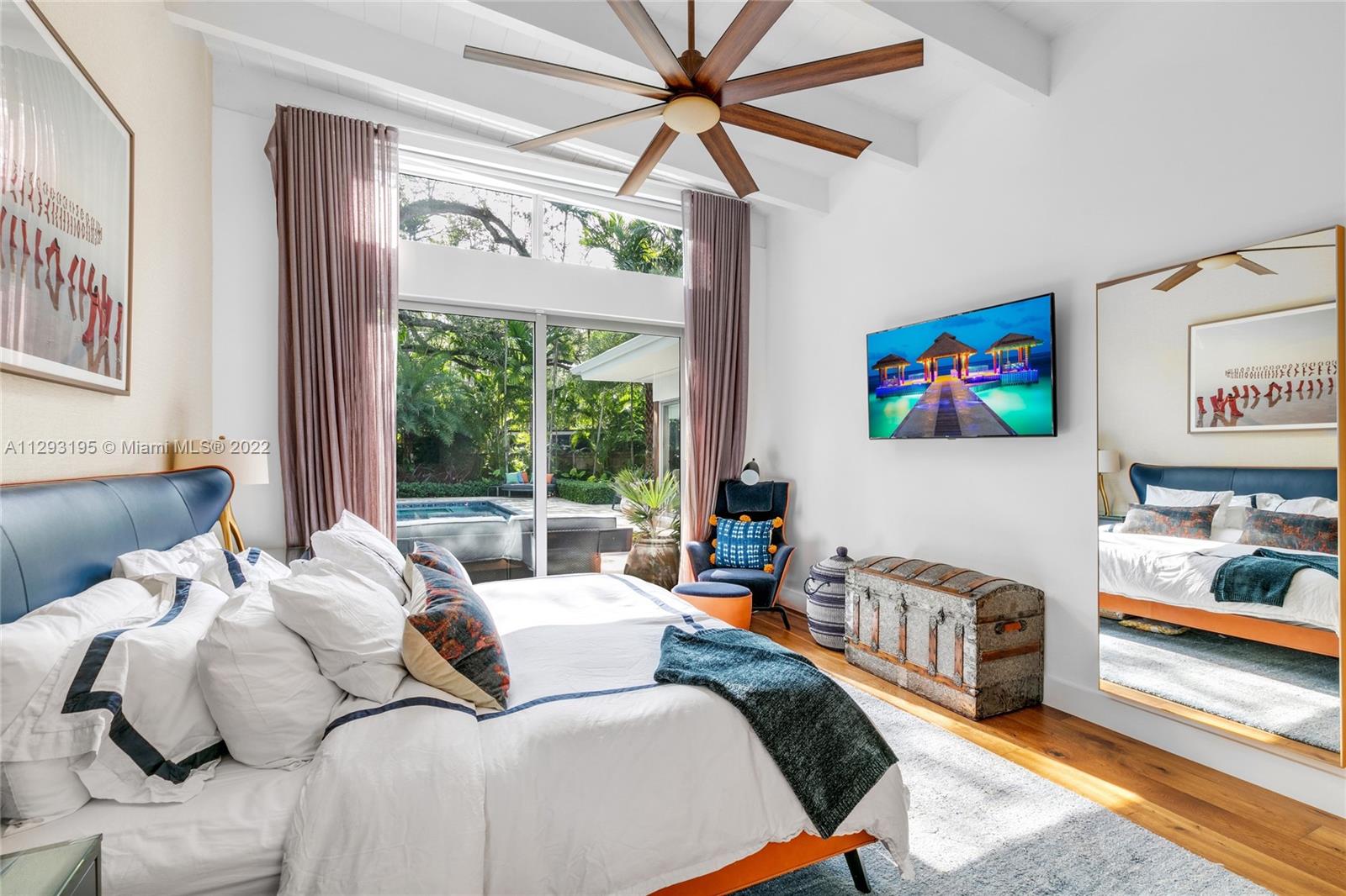 1666 Tigertail Avenue Miami, FL 33133 - Photo 17 of 41 a living room with furniture fireplace and a large window