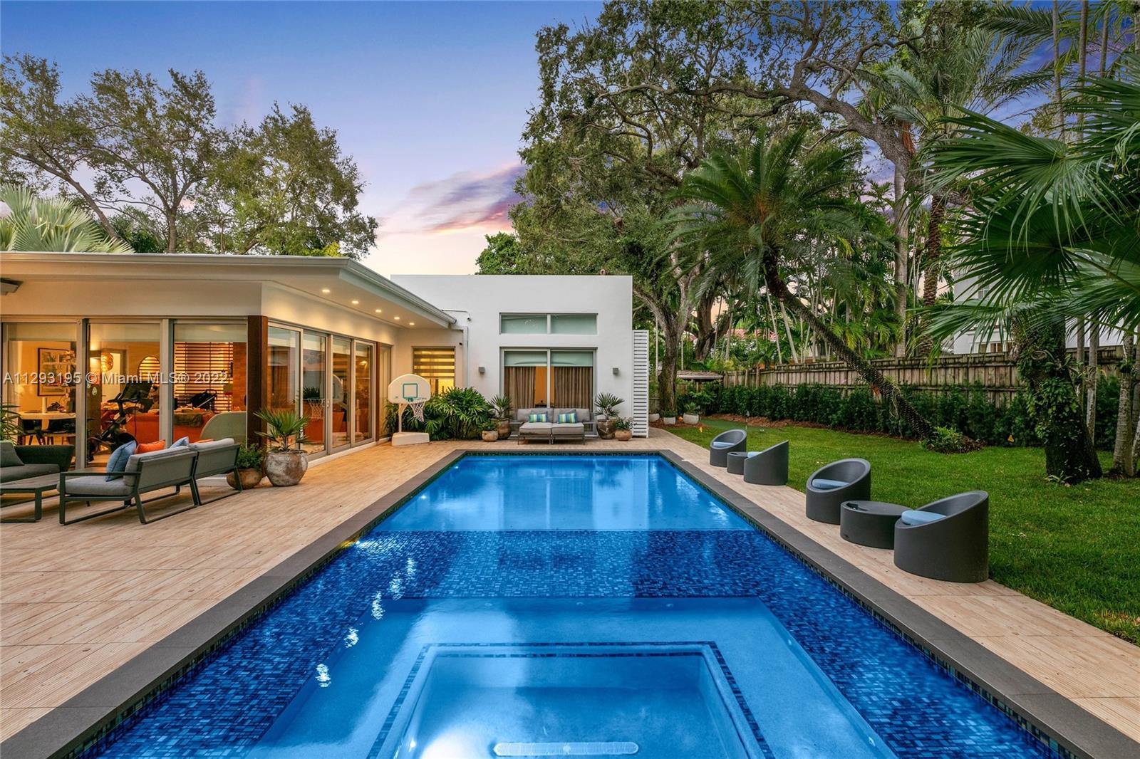 1666 Tigertail Avenue Miami, FL 33133 - Photo 2 of 41 a view of a house with swimming pool and sitting area