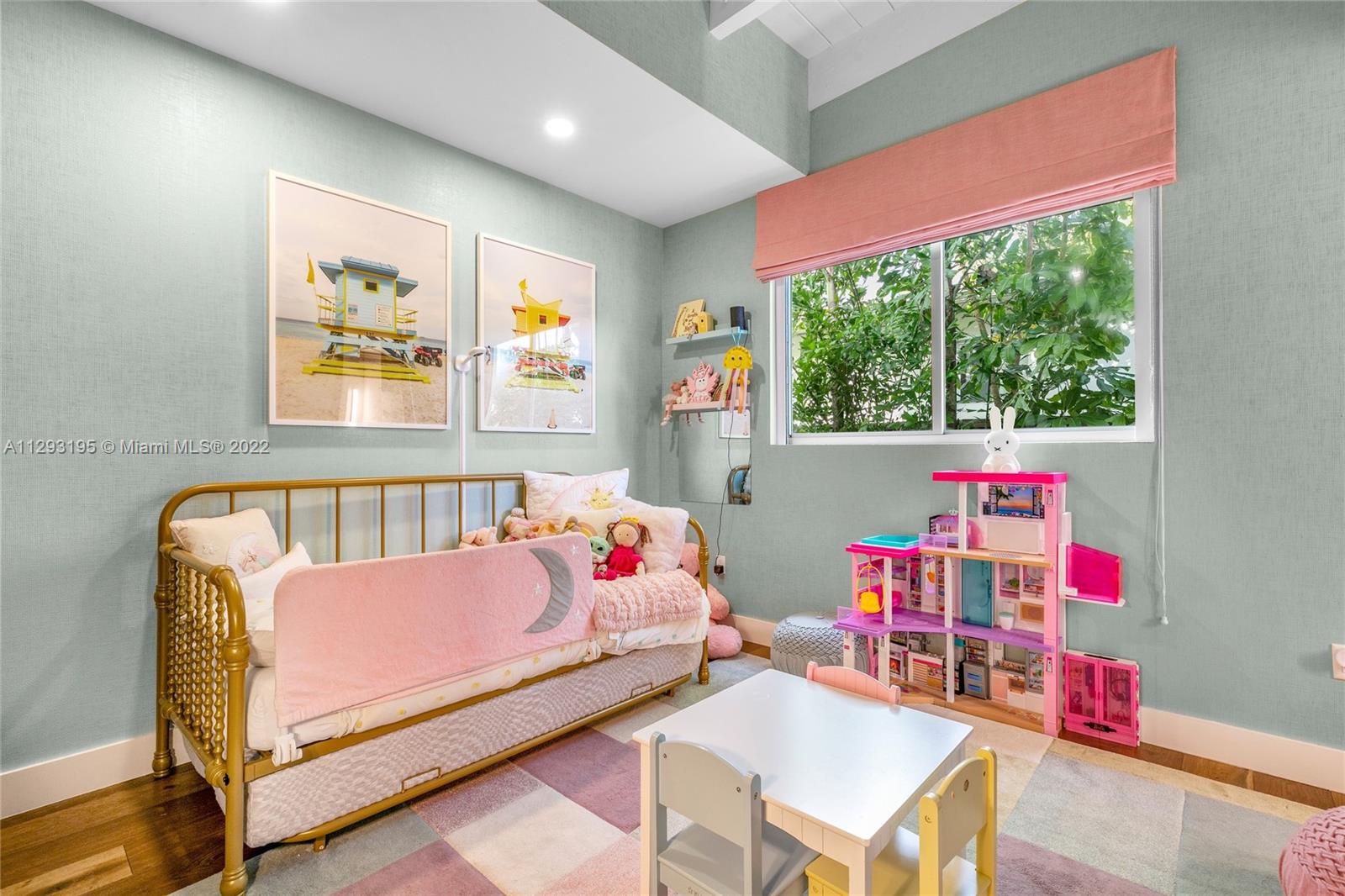 1666 Tigertail Avenue Miami, FL 33133 - Photo 21 of 41 a bedroom with a bed and a window