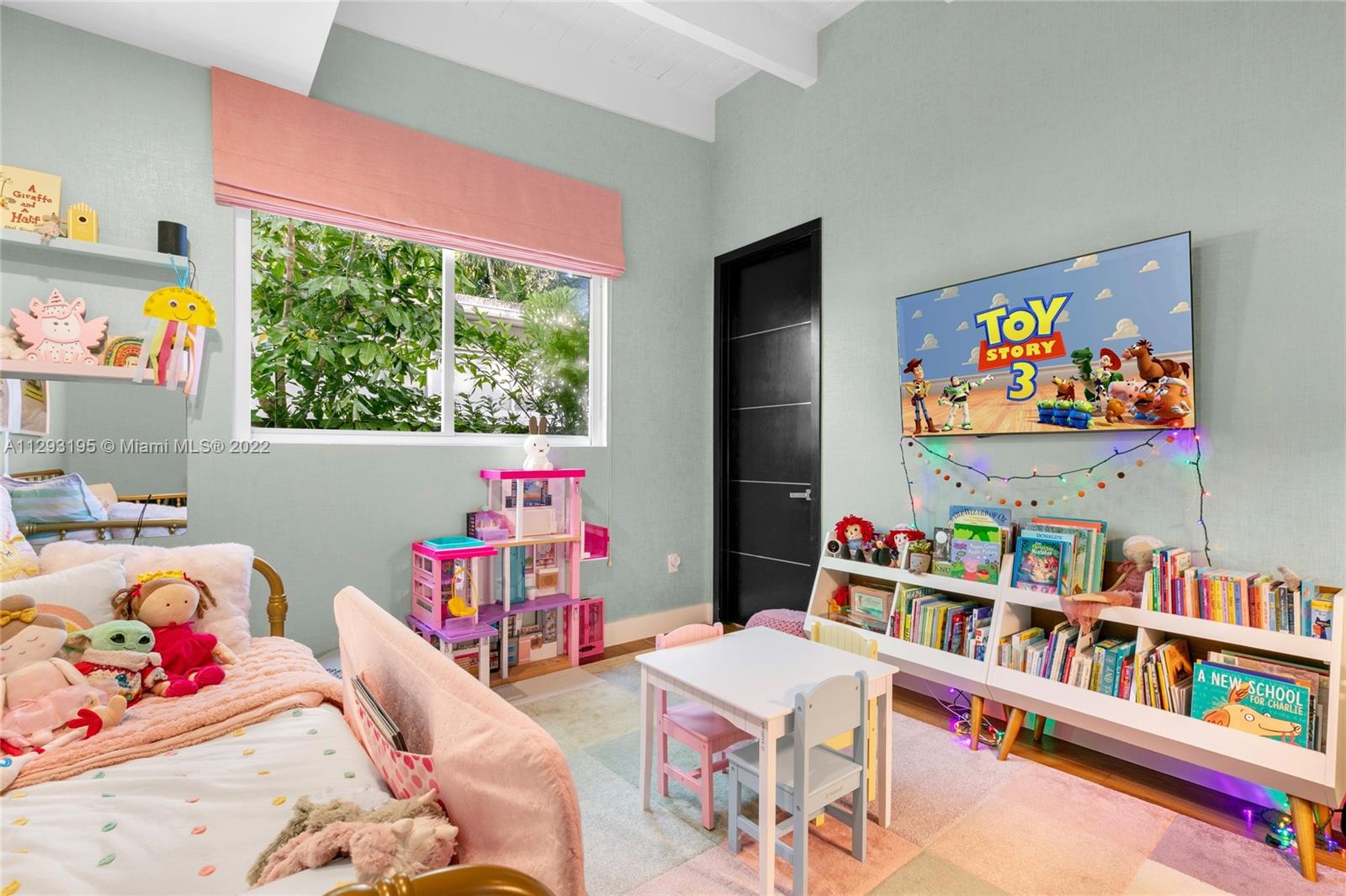 1666 Tigertail Avenue Miami, FL 33133 - Photo 22 of 41 a bedroom with furniture toys and a baby crib