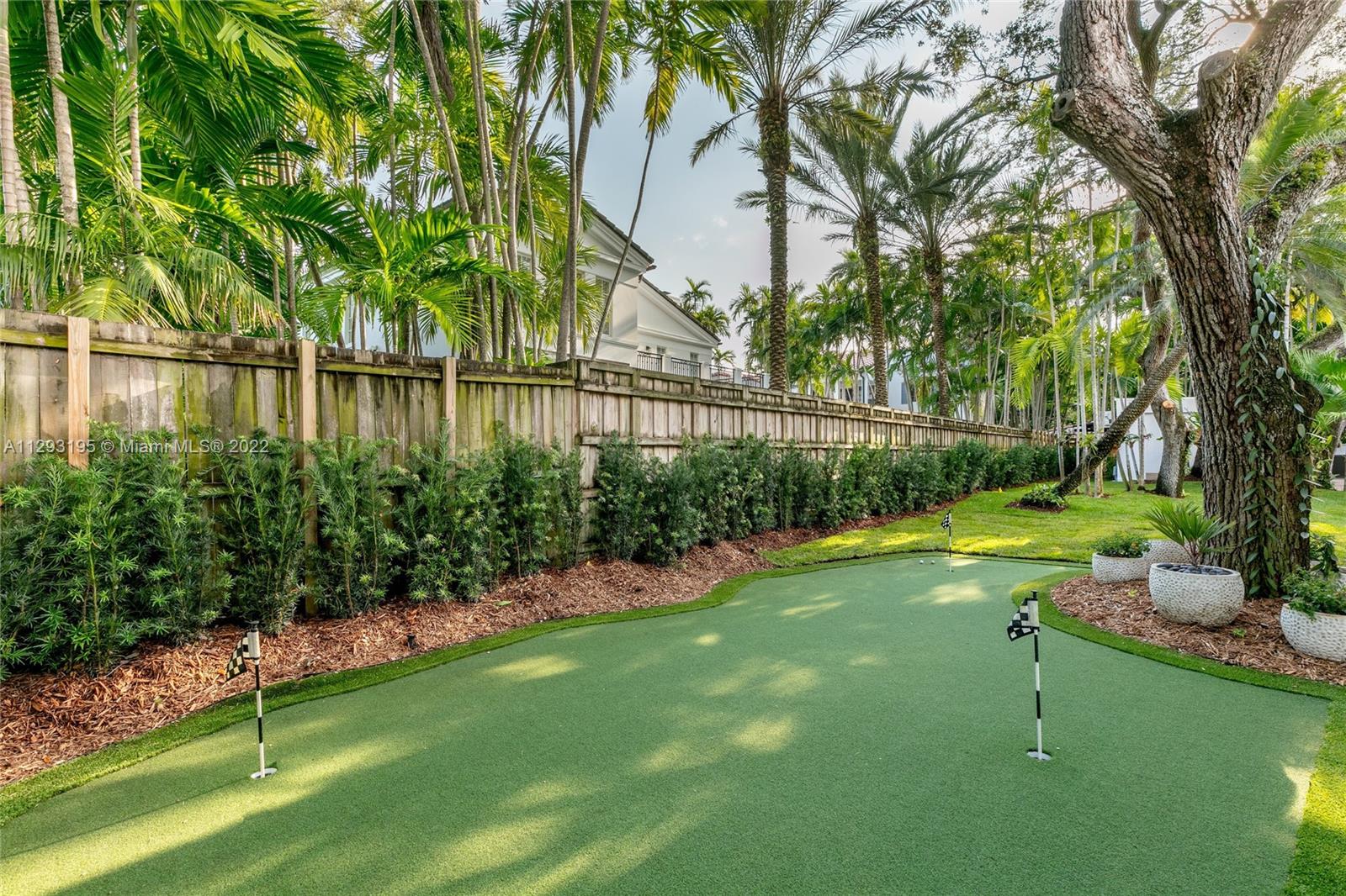 1666 Tigertail Avenue Miami, FL 33133 - Photo 36 of 41 a view of a garden