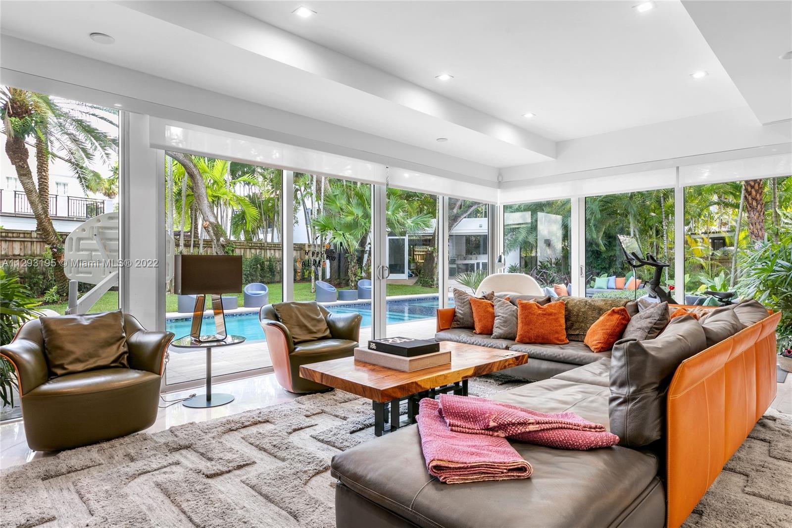 1666 Tigertail Avenue Miami, FL 33133 - Photo 8 of 41 a living room with furniture and a large window