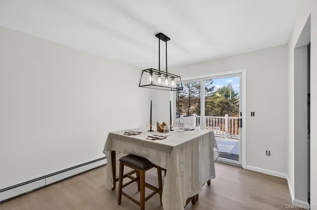 a bathroom with a toilet and a bathtub