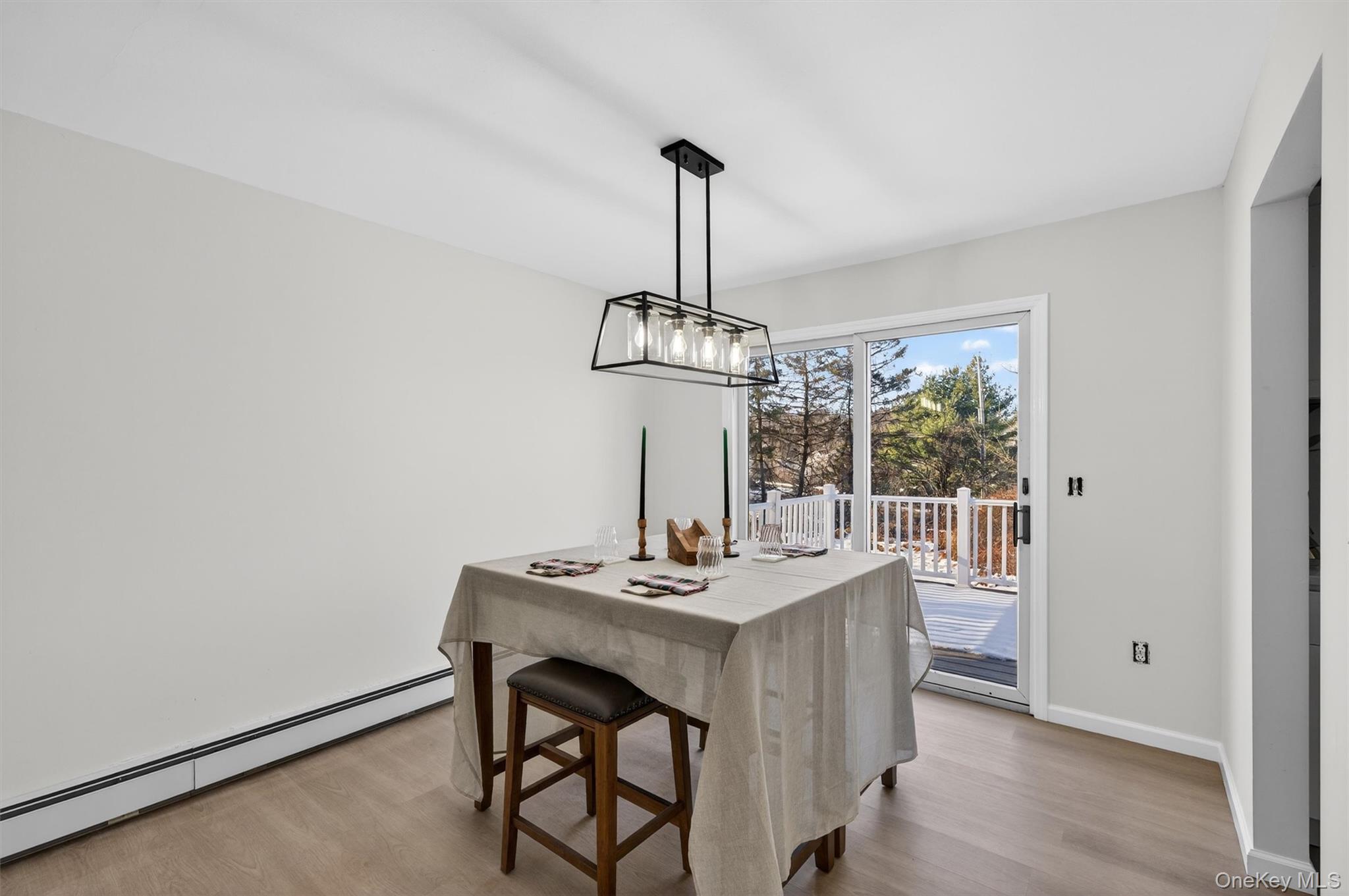 7 Edenville Road Warwick, NY 10990 - Photo 13 of 38 a dining room with a table and chairs
