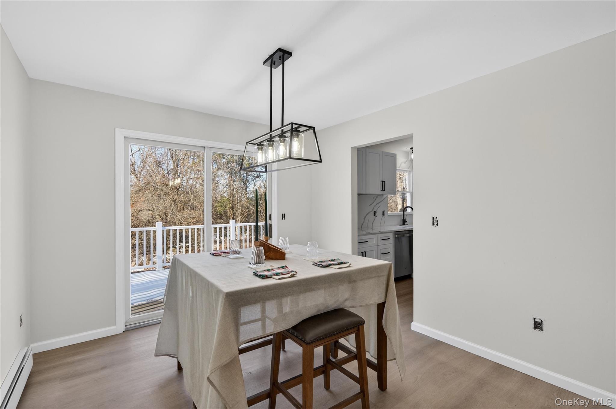 7 Edenville Road Warwick, NY 10990 - Photo 16 of 43 a dining room with a table and chairs