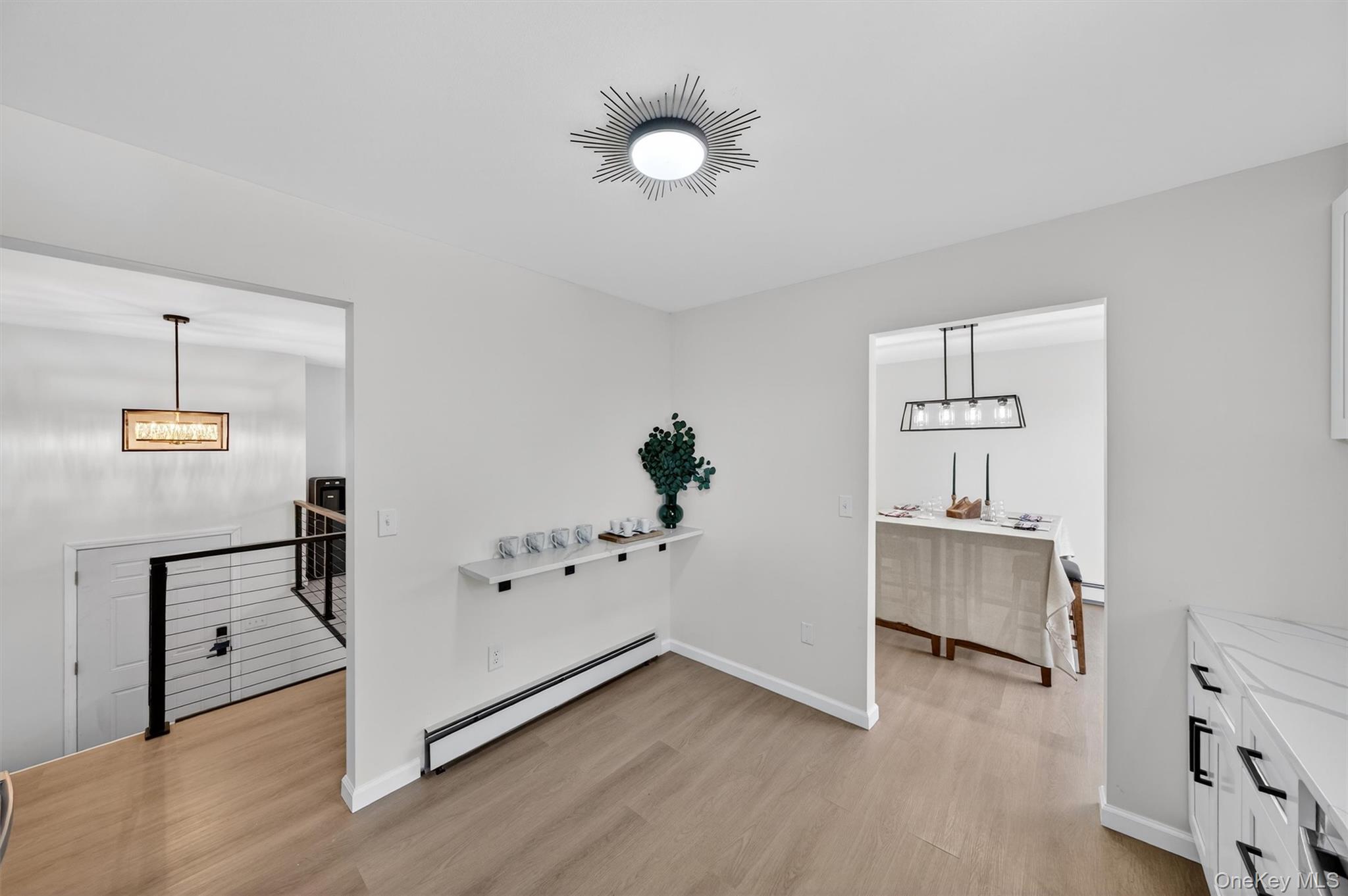7 Edenville Road Warwick, NY 10990 - Photo 16 of 38 Dining area with baseboard heating and light wood-type flooring