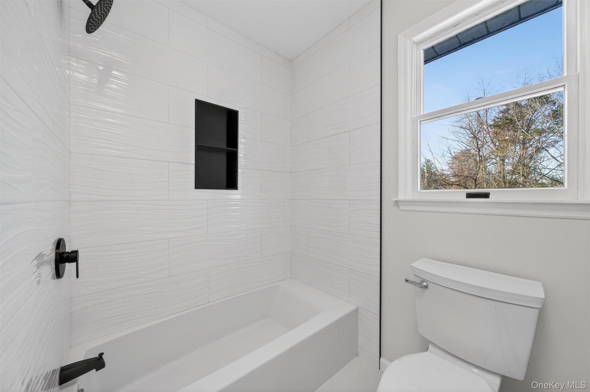 7 Edenville Road Warwick, NY 10990 - Photo 20 of 43 a bathroom with a toilet and a bathtub