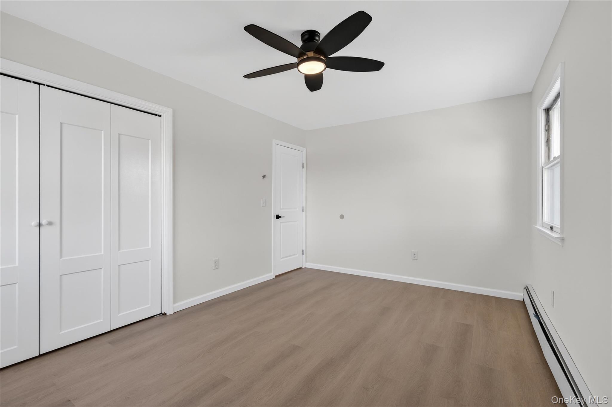 7 Edenville Road Warwick, NY 10990 - Photo 21 of 38 an empty room with ceiling fan and window