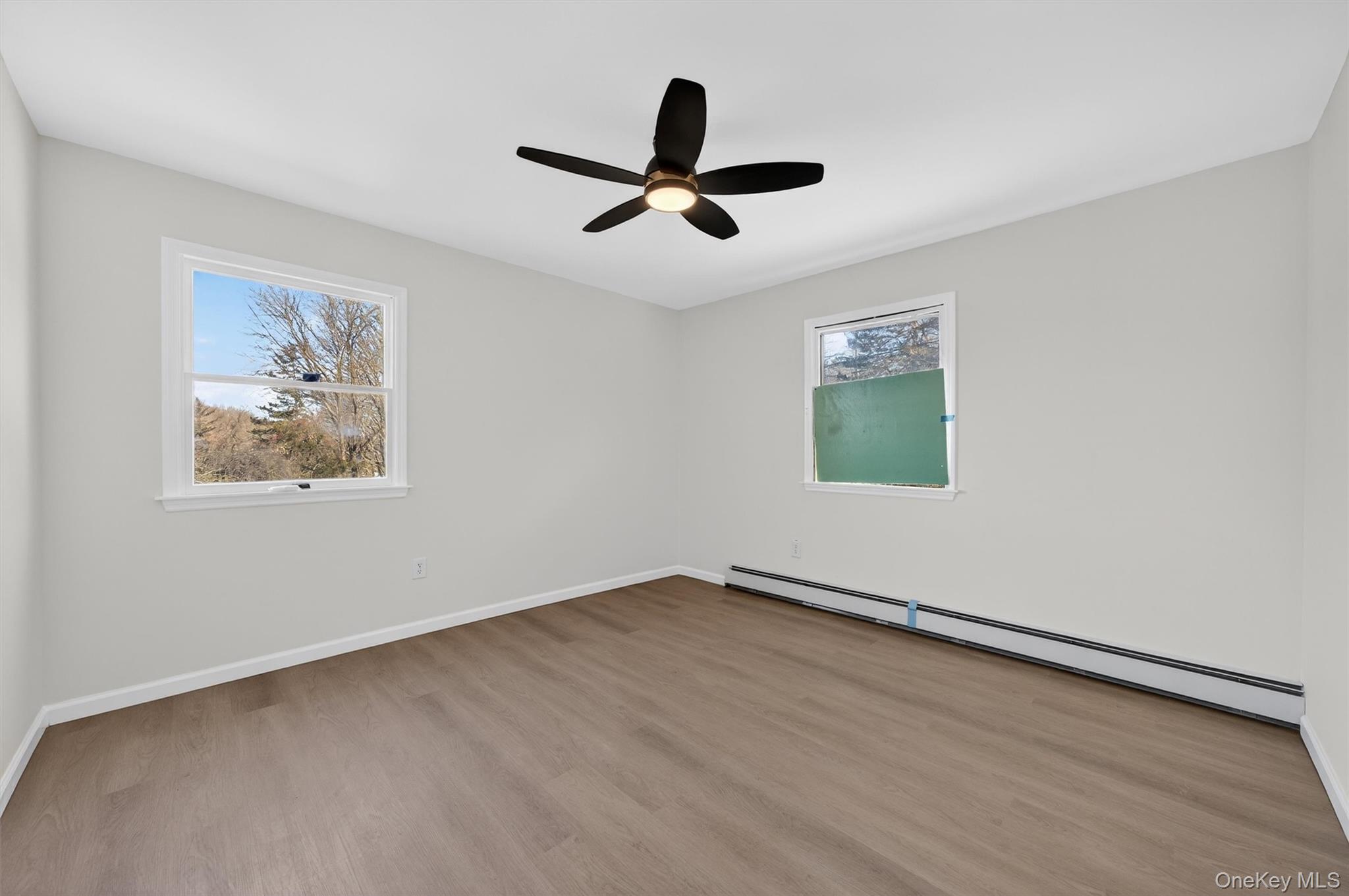 7 Edenville Road Warwick, NY 10990 - Photo 22 of 38 a view of empty room with wooden floor