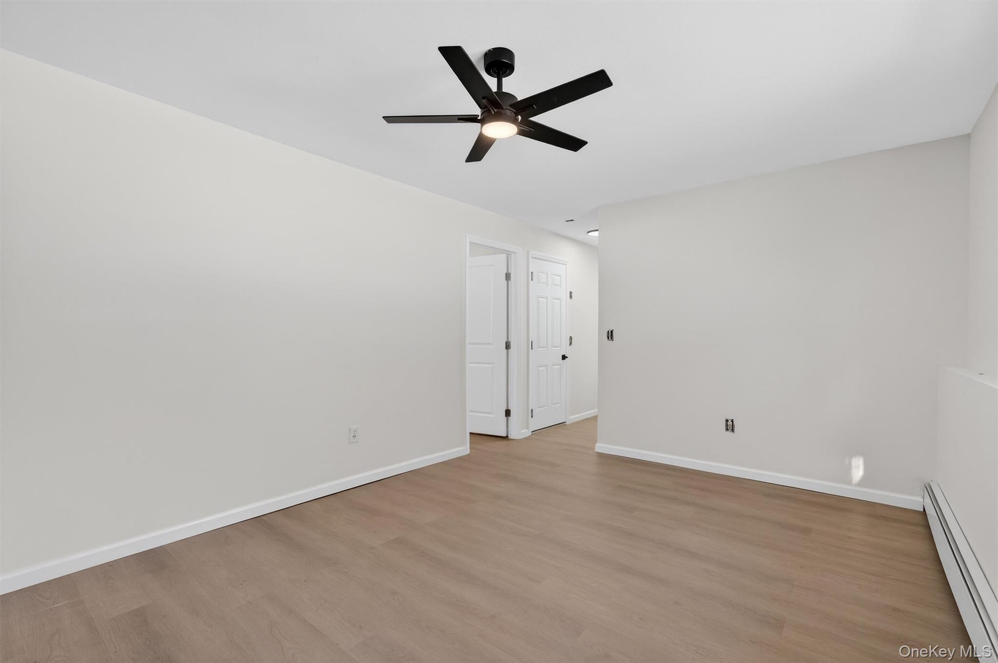 7 Edenville Road Warwick, NY 10990 - Photo 26 of 38 an empty room with ceiling fan and window