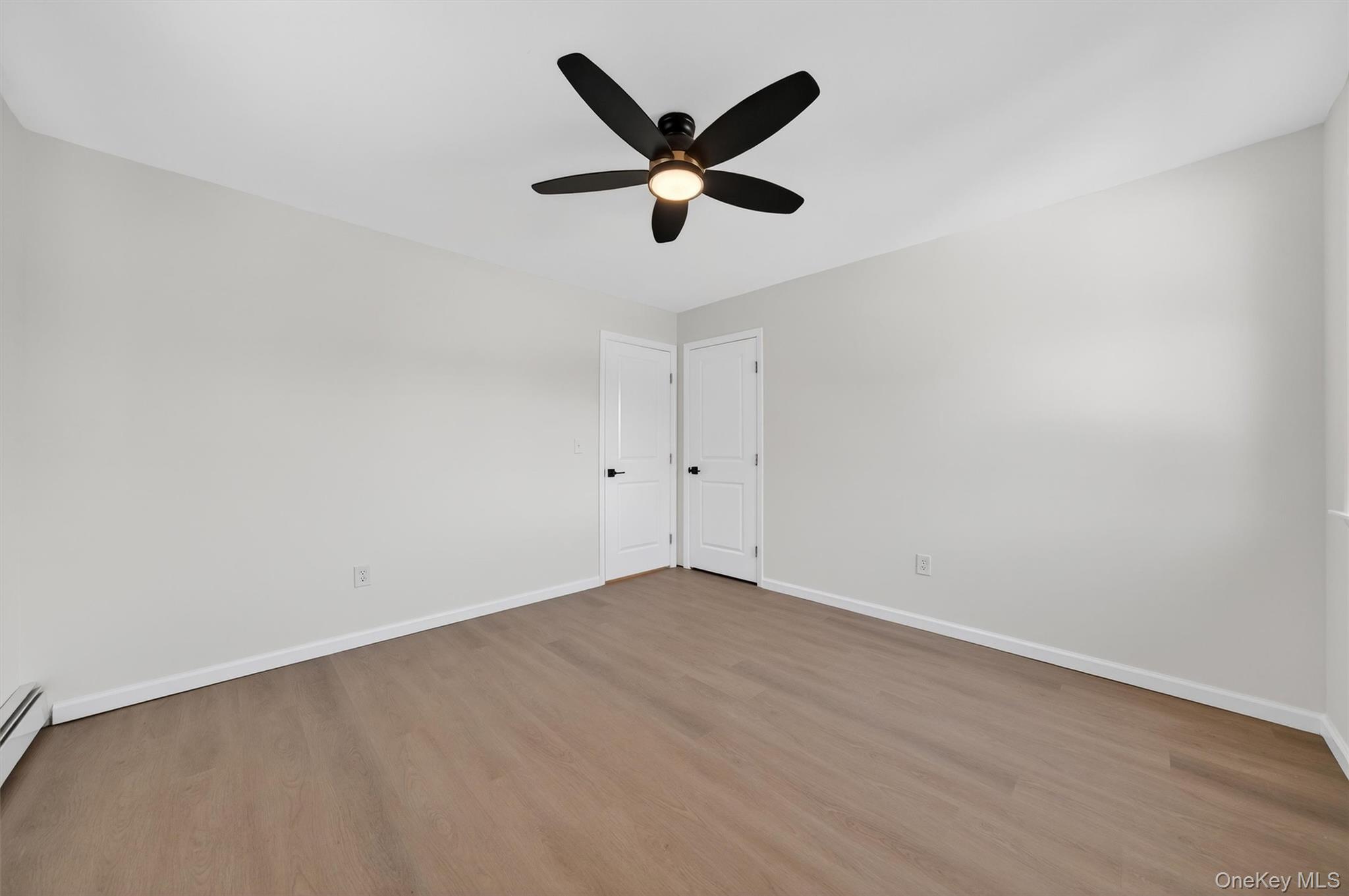 7 Edenville Road Warwick, NY 10990 - Photo 26 of 43 an empty room with ceiling fan and window