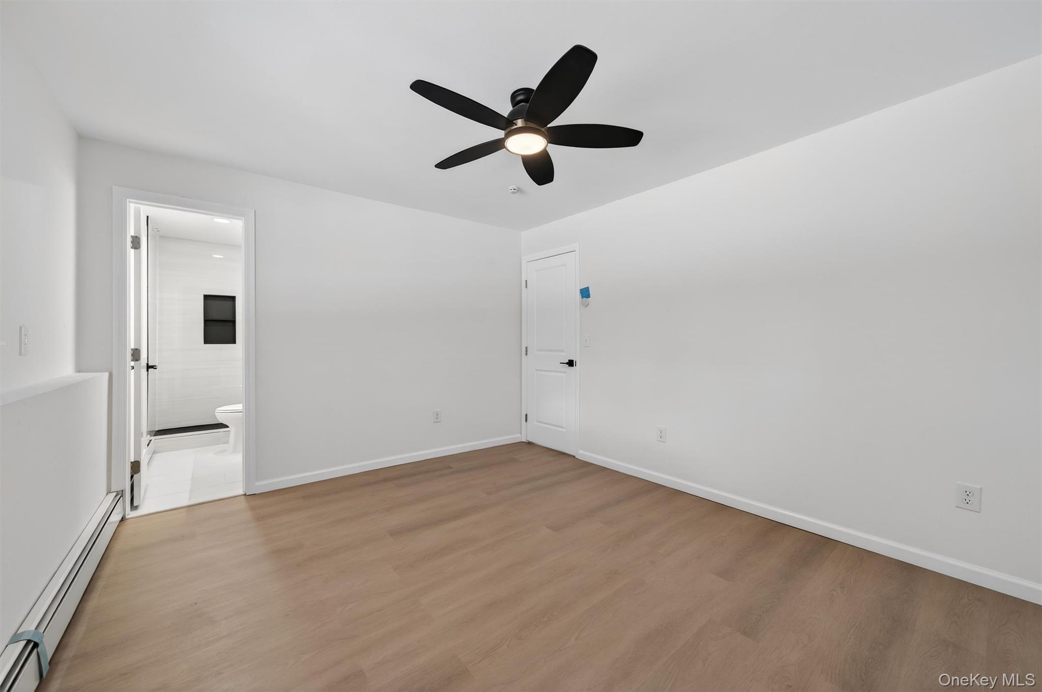 7 Edenville Road Warwick, NY 10990 - Photo 34 of 43 an empty room with closet and ceiling fan