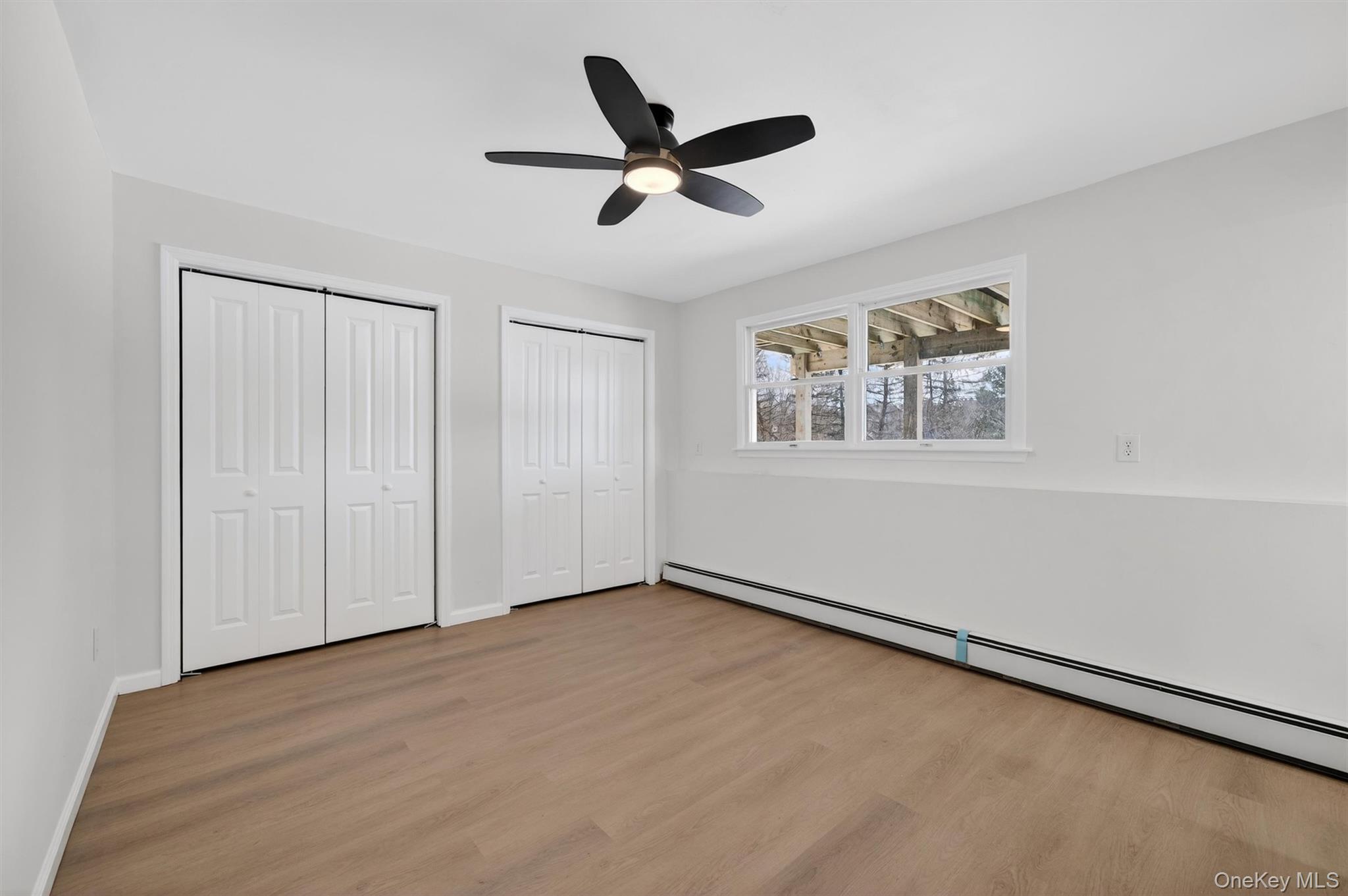 7 Edenville Road Warwick, NY 10990 - Photo 35 of 43 wooden floor in an empty room with a window