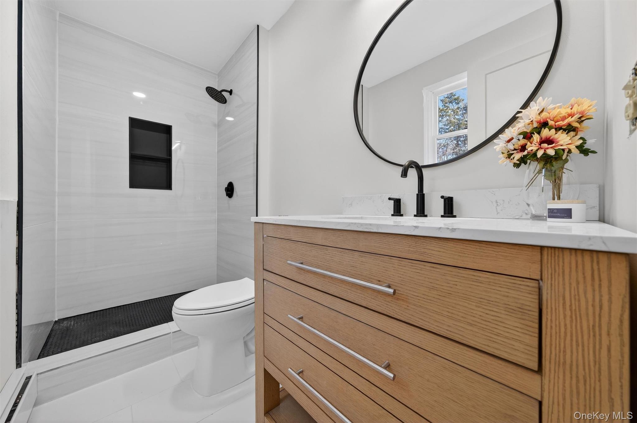 7 Edenville Road Warwick, NY 10990 - Photo 36 of 43 a bathroom with a sink mirror and toilet