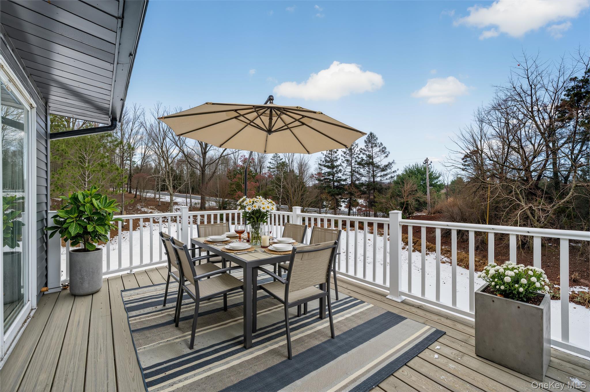 7 Edenville Road Warwick, NY 10990 - Photo 40 of 43 a view of a chair and table on the wooden roof deck