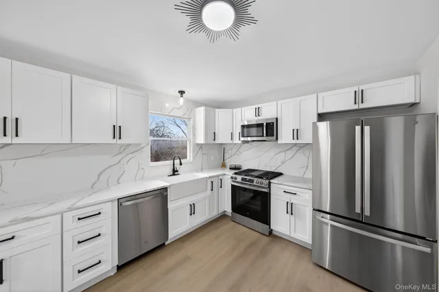a dining room with a table and chairs