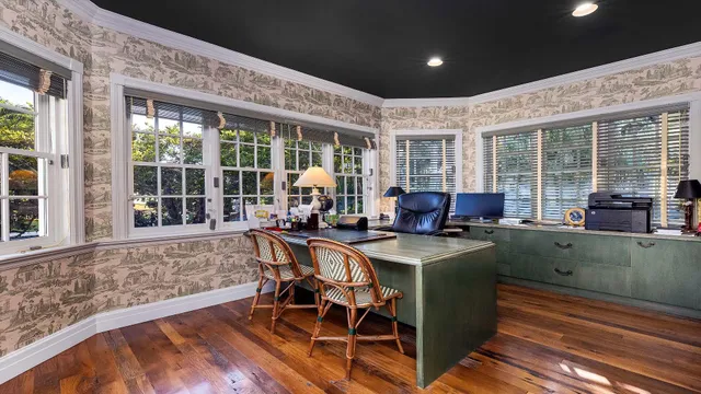 a view of a dining room with furniture window and outside view
