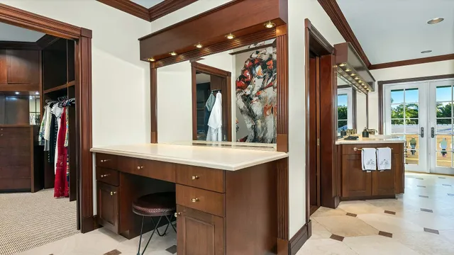 a bathroom with a double vanity sink and a mirror