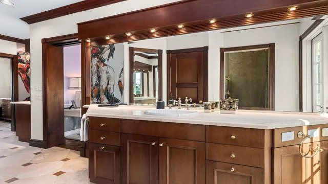 a bathroom with a shower and a sink