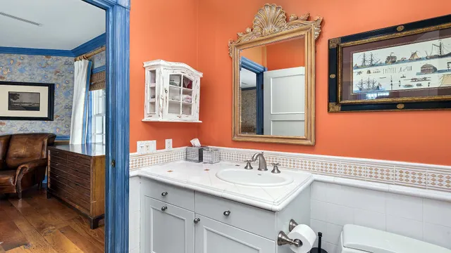 a front view of multiple houses with yard